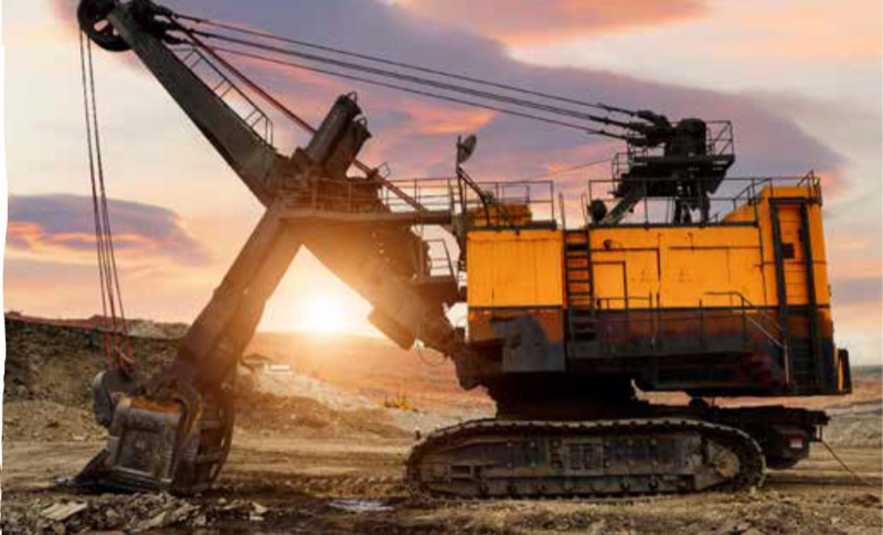 Electric rope shovel working at a Pilbara mining operation at dusk