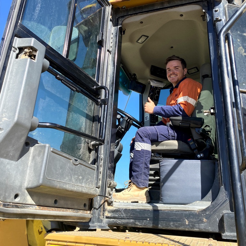 RJV operator in the cab of earthmoving plant